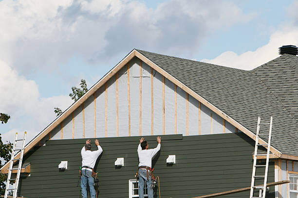 Professional Siding Replacement technician working in Rhodesdale, MD